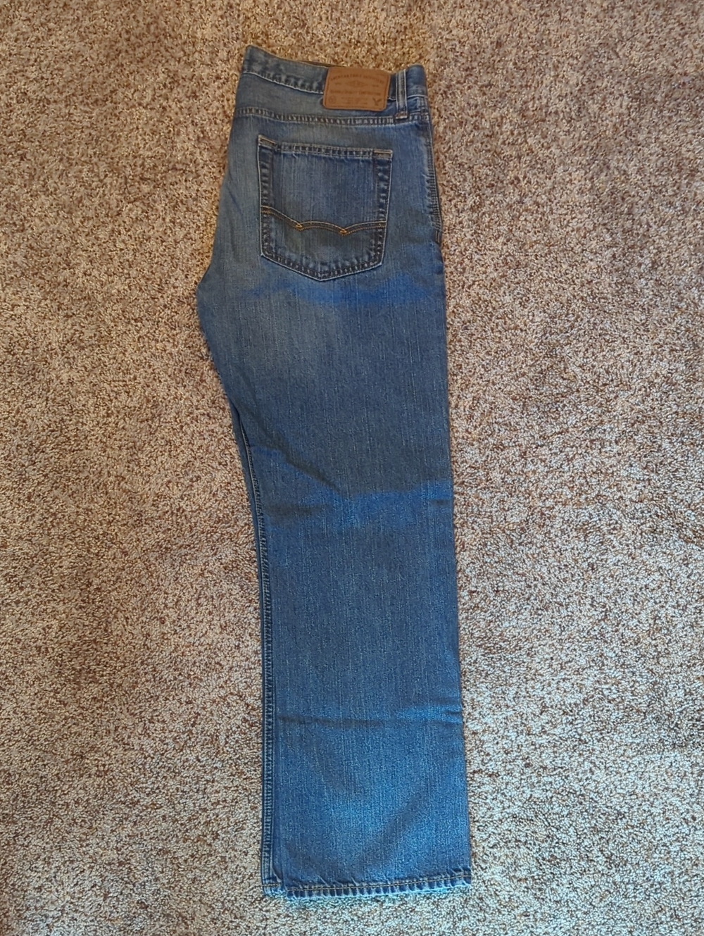 American Eagle Outfitters Denim Jeans in Blue with Tan Patch